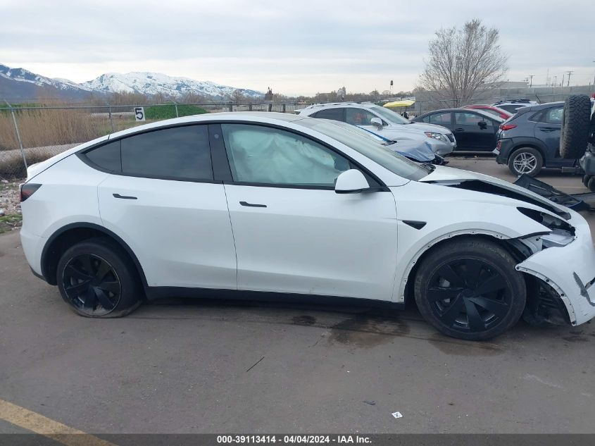 2023 Tesla Model Y Awd/Long Range Dual Motor All-Wheel Drive VIN: 7SAYGDEE6PF612311 Lot: 39113414