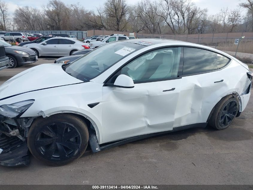 2023 Tesla Model Y Awd/Long Range Dual Motor All-Wheel Drive VIN: 7SAYGDEE6PF612311 Lot: 39113414