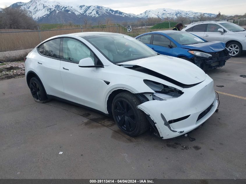 2023 Tesla Model Y Awd/Long Range Dual Motor All-Wheel Drive VIN: 7SAYGDEE6PF612311 Lot: 39113414