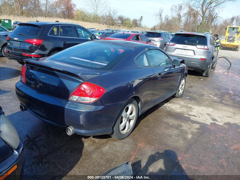 2005 Hyundai Tiburon Gs VIN: KM8HM65D15U182843 Lot: 39125701