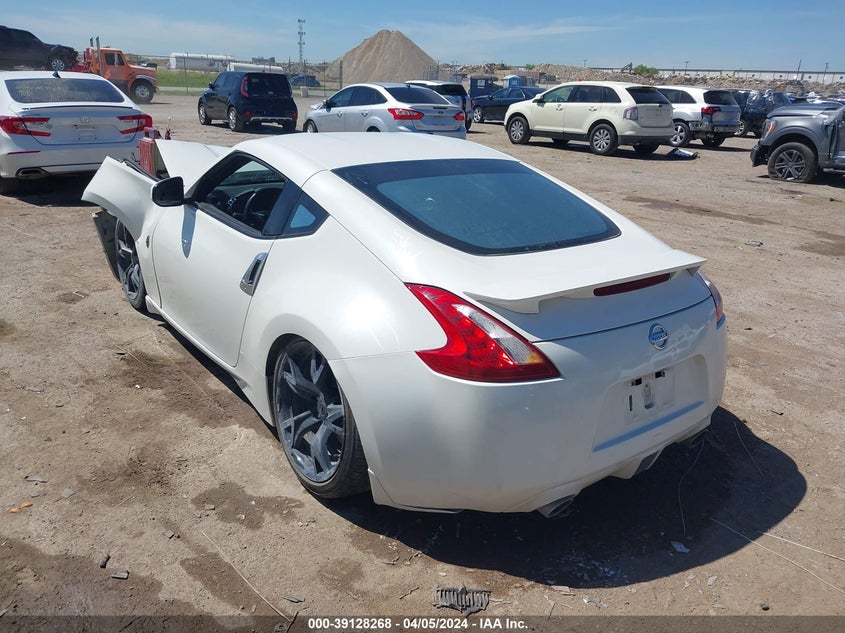 2009 Nissan 370Z VIN: JN1AZ44E59M403262 Lot: 39128268