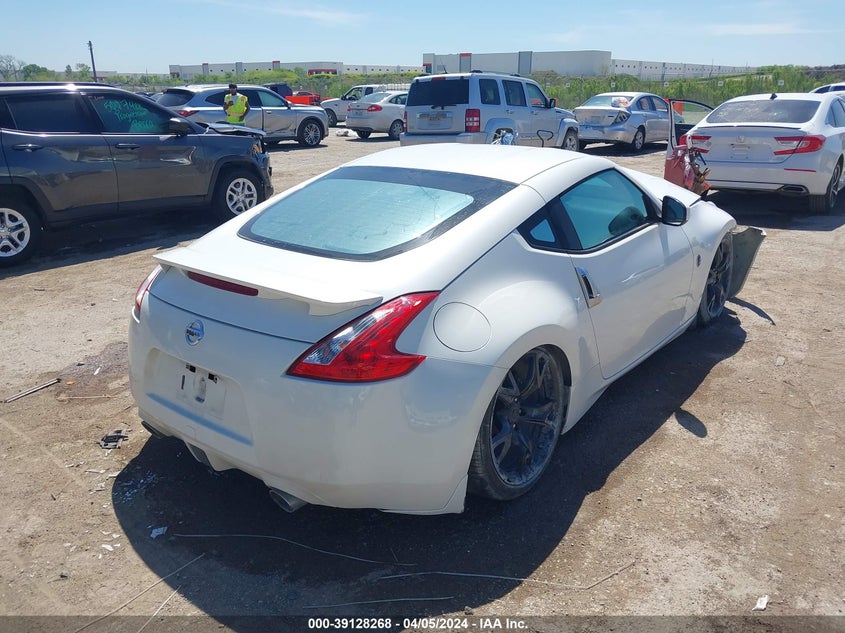 2009 Nissan 370Z VIN: JN1AZ44E59M403262 Lot: 39128268