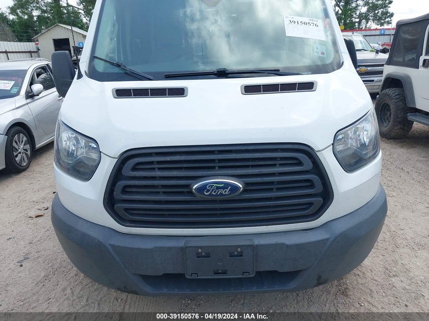 2018 Ford Transit-150 VIN: 1FTYE2CM2JKA24692 Lot: 39150576