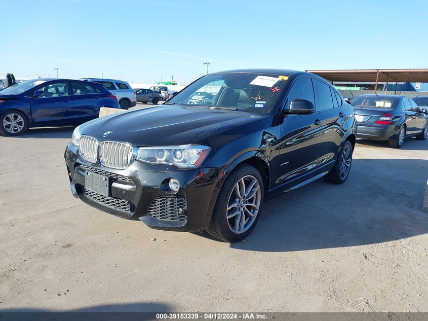 2015 BMW X4 xDrive28I VIN: 5UXXW3C51F0M87495 Lot: 39153339