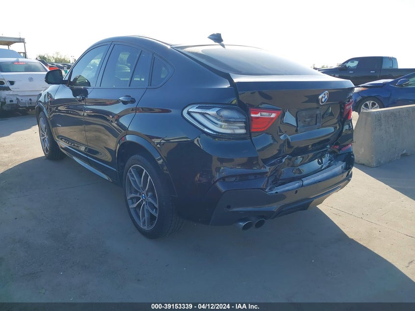 2015 BMW X4 xDrive28I VIN: 5UXXW3C51F0M87495 Lot: 39153339