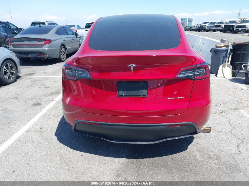 2023 Tesla Model Y Awd/Long Range Dual Motor All-Wheel Drive VIN: 7SAYGDEE9PA180584 Lot: 39162674