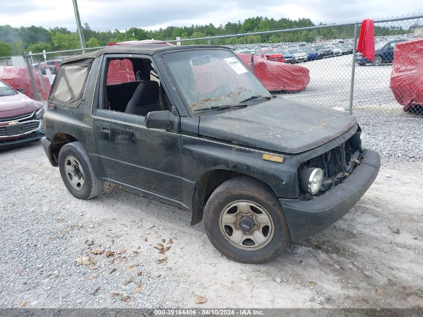 1997 Geo Tracker Softtop VIN: 2CNBE1867V6926284 Lot: 39164406