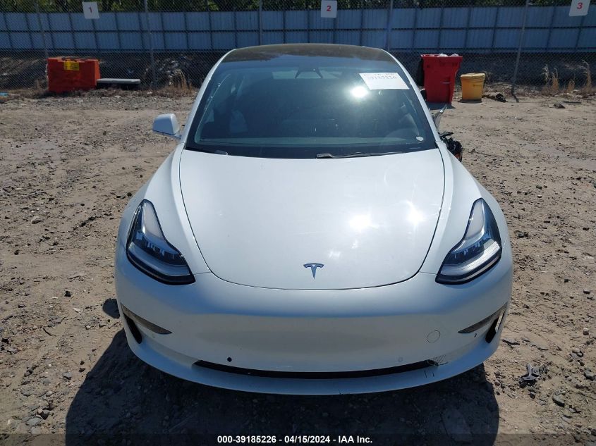 2018 Tesla Model 3 Long Range/Mid Range VIN: 5YJ3E1EA0JF053709 Lot: 39185226