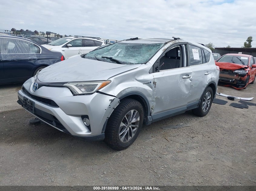 2016 TOYOTA RAV4 HYBRID XLE - JTMRJREV3GD017844