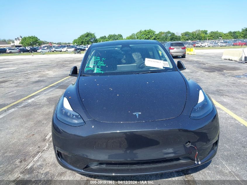 2024 Tesla Model Y Long Range Dual Motor All-Wheel Drive VIN: 7SAYGDEE8RF037762 Lot: 39191963