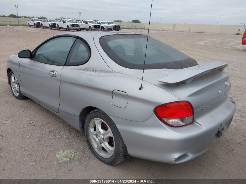 2001 Hyundai Tiburon Base Pkg 1 2 VIN: KMHJG25F91U265160 Lot: 39199914