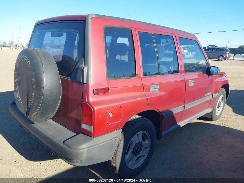 1998 Chevrolet Tracker VIN: 2CNBE1361W6917427 Lot: 39207128