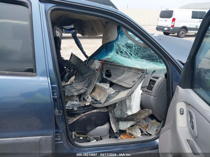 2001 Mazda Tribute Dx VIN: 4F2UU07B21KM19244 Lot: 39215697