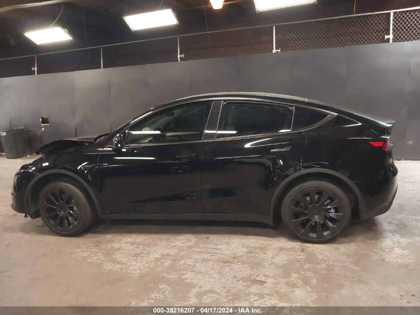 2023 Tesla Model Y Awd/Long Range Dual Motor All-Wheel Drive VIN: 7SAYGDEE0PA141429 Lot: 39216207