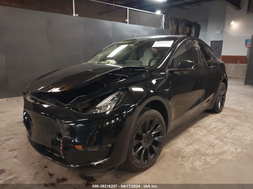 2023 Tesla Model Y Awd/Long Range Dual Motor All-Wheel Drive VIN: 7SAYGDEE0PA141429 Lot: 39216207