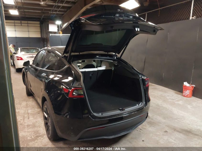 2023 Tesla Model Y Awd/Long Range Dual Motor All-Wheel Drive VIN: 7SAYGDEE0PA141429 Lot: 39216207