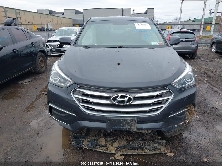 2018 Hyundai Santa Fe Sport 2.4L VIN: 5XYZTDLB8JG564381 Lot: 39217035