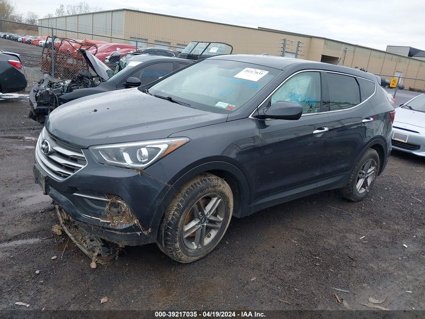 2018 Hyundai Santa Fe Sport 2.4L VIN: 5XYZTDLB8JG564381 Lot: 39217035