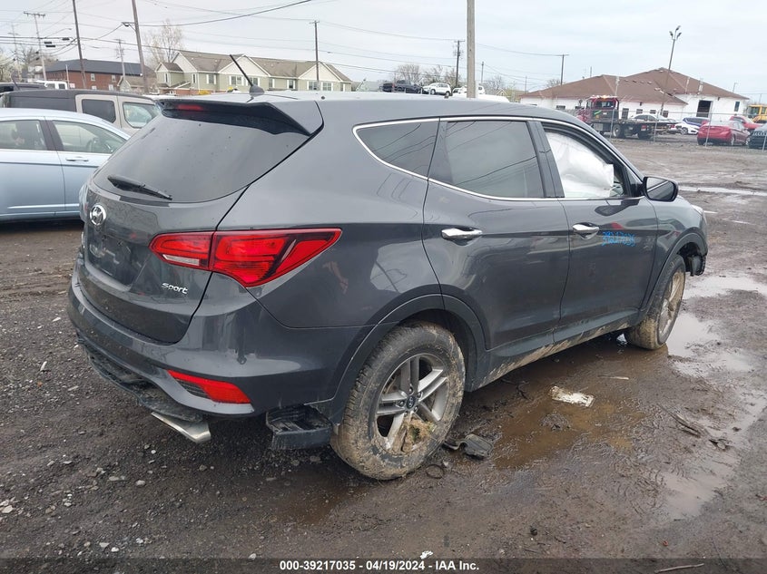 2018 Hyundai Santa Fe Sport 2.4L VIN: 5XYZTDLB8JG564381 Lot: 39217035