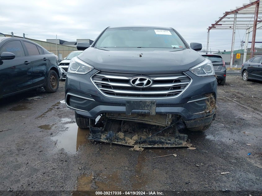 2018 Hyundai Santa Fe Sport 2.4L VIN: 5XYZTDLB8JG564381 Lot: 39217035