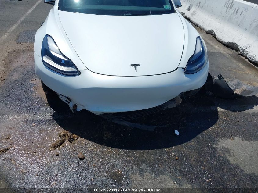 2022 Tesla Model 3 Long Range Dual Motor All-Wheel Drive VIN: 5YJ3E1EB0NF112496 Lot: 39223312