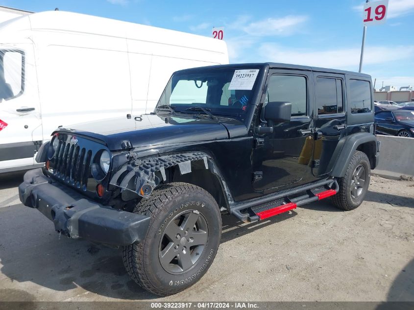 2011 Jeep Wrangler Unlimited Rubicon VIN: 1J4HA6H18BL536450 Lot: 50248534