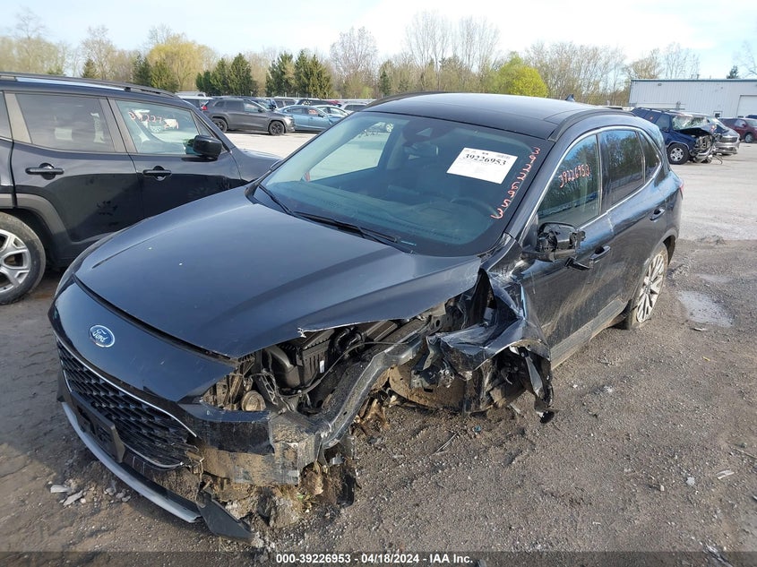 2020 Ford Escape Titanium VIN: 1FMCU9J97LUA20404 Lot: 39226953