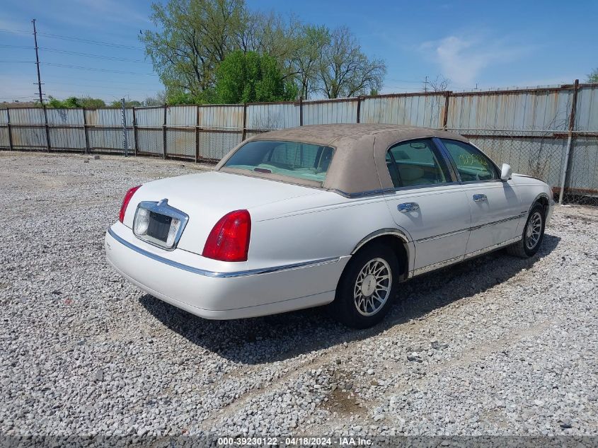 2000 Lincoln Town Car Signature VIN: 1LNHM82W4YY860869 Lot: 39230122