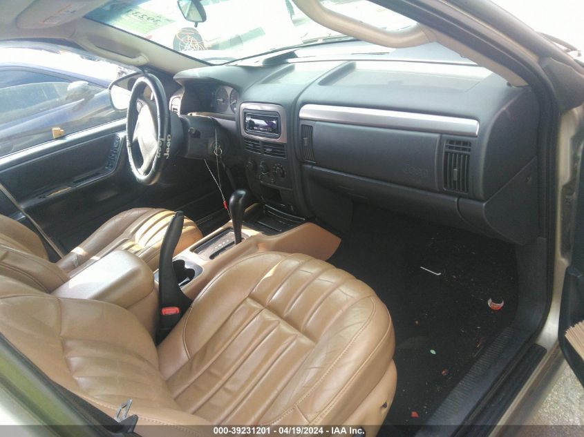 2003 Jeep Grand Cherokee Laredo VIN: 1J4GX48S03C588597 Lot: 39231201