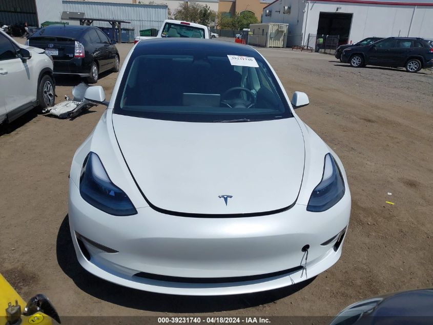 2023 Tesla Model 3 Long Range Dual Motor All-Wheel Drive VIN: 5YJ3E1EBXPF631106 Lot: 39254409