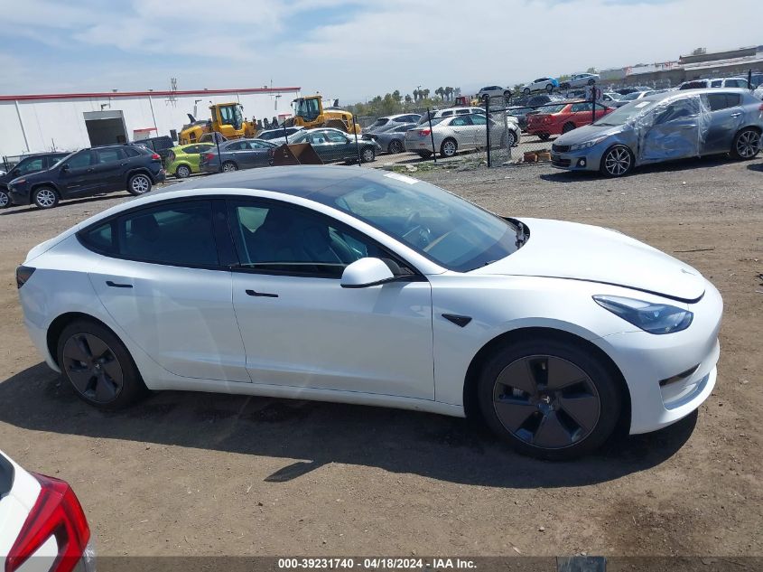 2023 Tesla Model 3 Long Range Dual Motor All-Wheel Drive VIN: 5YJ3E1EBXPF631106 Lot: 39231740