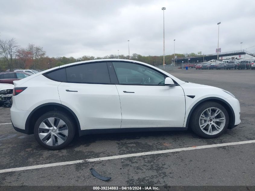 2023 Tesla Model Y Awd/Long Range Dual Motor All-Wheel Drive VIN: 7SAYGDEE3PA063213 Lot: 39234883