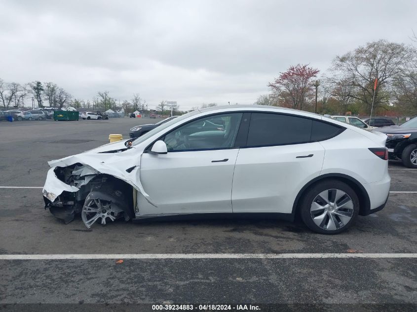 2023 Tesla Model Y Awd/Long Range Dual Motor All-Wheel Drive VIN: 7SAYGDEE3PA063213 Lot: 39234883