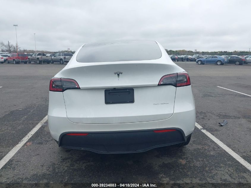 2023 Tesla Model Y Awd/Long Range Dual Motor All-Wheel Drive VIN: 7SAYGDEE3PA063213 Lot: 39234883