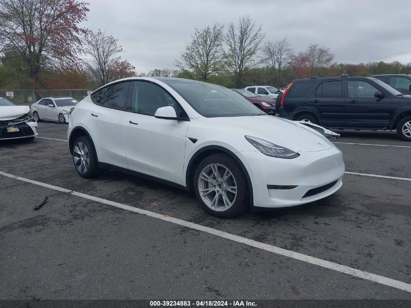 2023 Tesla Model Y Awd/Long Range Dual Motor All-Wheel Drive VIN: 7SAYGDEE3PA063213 Lot: 39234883