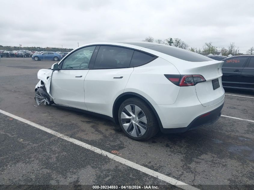 2023 Tesla Model Y Awd/Long Range Dual Motor All-Wheel Drive VIN: 7SAYGDEE3PA063213 Lot: 39234883