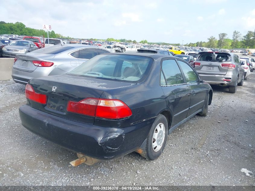 2000 Honda Accord 2.3 Dx VIN: JHMCF8644YC000077 Lot: 39236378