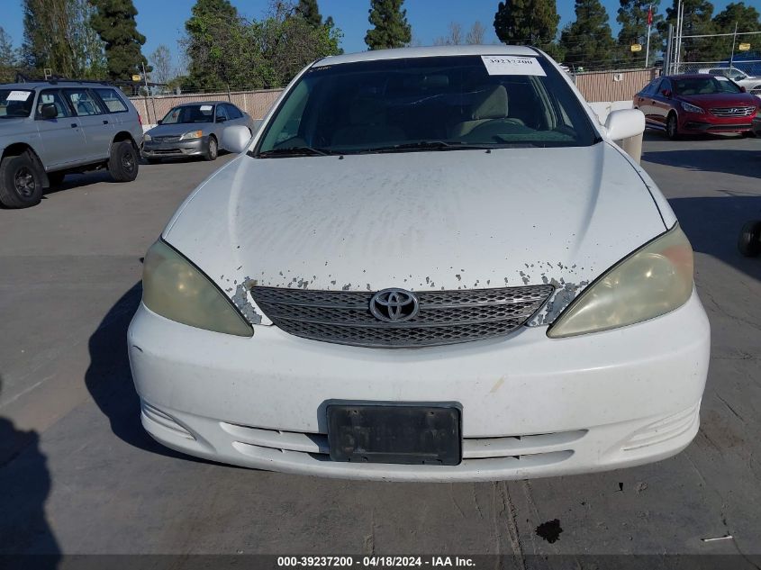 2004 Toyota Camry Le VIN: 4T1BE32K04U290910 Lot: 39237200