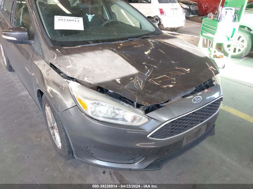 2016 Ford Focus Se VIN: 1FADP3F25GL282464 Lot: 39238914