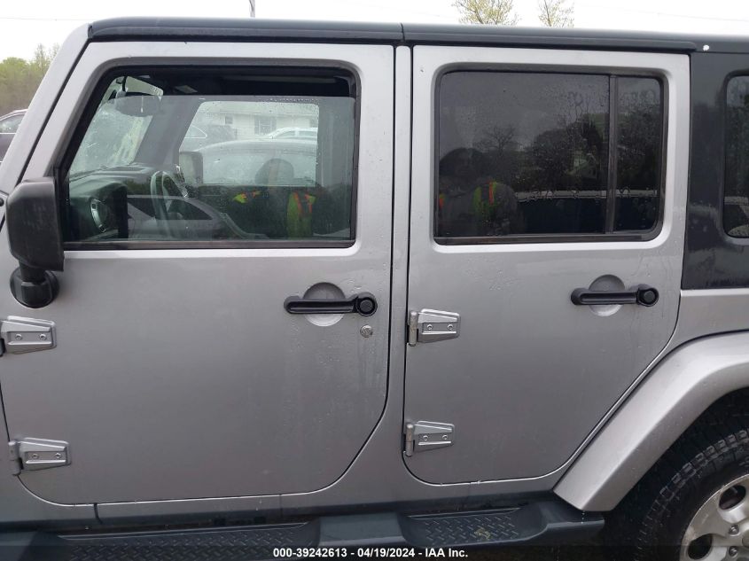 2015 Jeep Wrangler Unlimited Sahara VIN: 1C4BJWEGXFL704308 Lot: 39242613