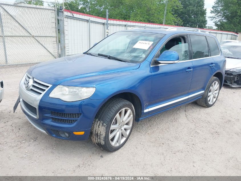 2010 Volkswagen Touareg V6 Tdi VIN: WVGAK7A97AD002869 Lot: 39243676