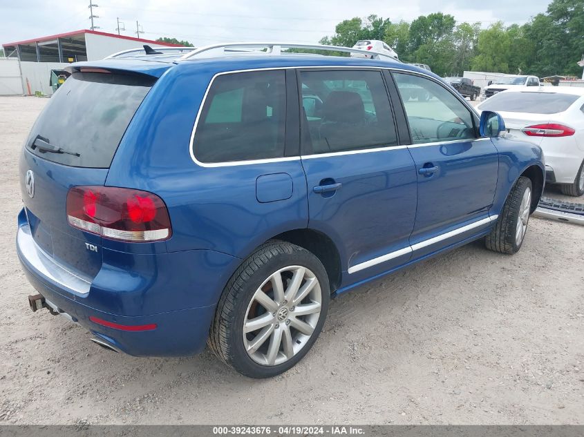 2010 Volkswagen Touareg V6 Tdi VIN: WVGAK7A97AD002869 Lot: 39243676