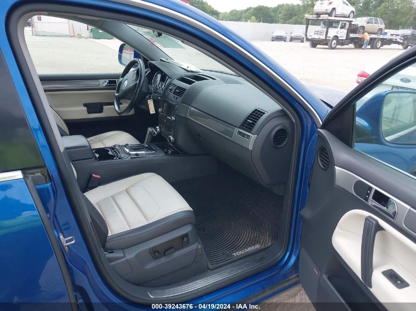 2010 Volkswagen Touareg V6 Tdi VIN: WVGAK7A97AD002869 Lot: 39243676