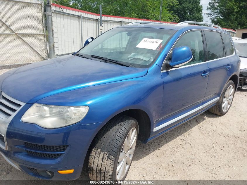 2010 Volkswagen Touareg V6 Tdi VIN: WVGAK7A97AD002869 Lot: 39243676