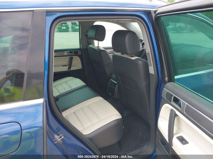 2010 Volkswagen Touareg V6 Tdi VIN: WVGAK7A97AD002869 Lot: 39243676