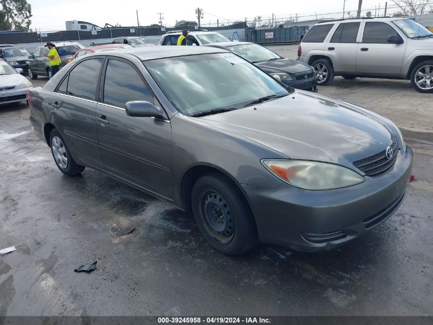 2004 Toyota Camry Le VIN: JTDBE32K840284526 Lot: 39245958