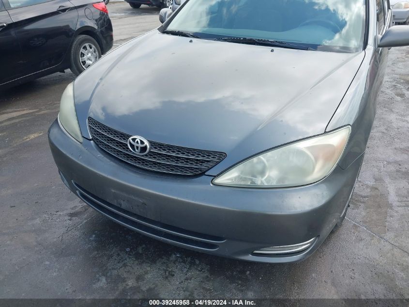 2004 Toyota Camry Le VIN: JTDBE32K840284526 Lot: 39245958