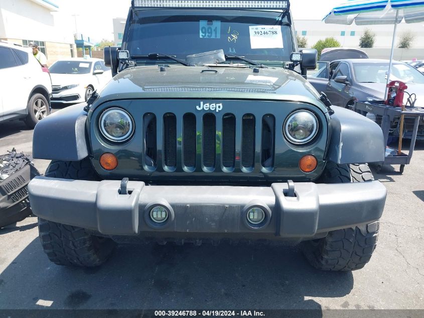 2011 Jeep Wrangler Unlimited Sport VIN: 1J4BA3H10BL580317 Lot: 39246788