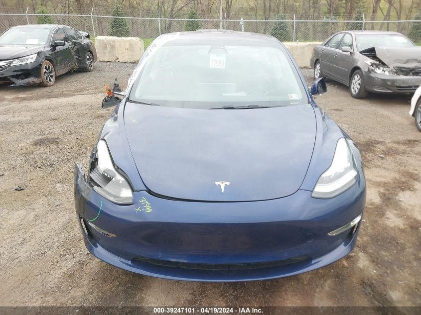 2018 Tesla Model 3 Long Range/Mid Range VIN: 5YJ3E1EA7JF077893 Lot: 39247101