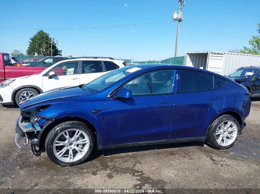 2023 Tesla Model Y Awd/Long Range Dual Motor All-Wheel Drive VIN: 7SAYGAEE2PF667255 Lot: 39250510